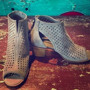 Taupe soft suede open toe & side cutout bootie.